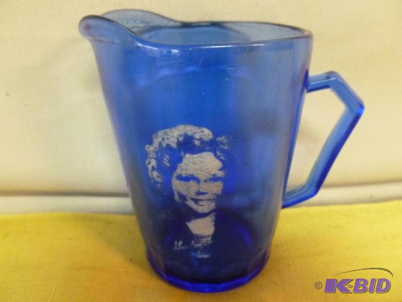 lot 83 image: Vintage Shirley Temple cobalt blue glass crea...