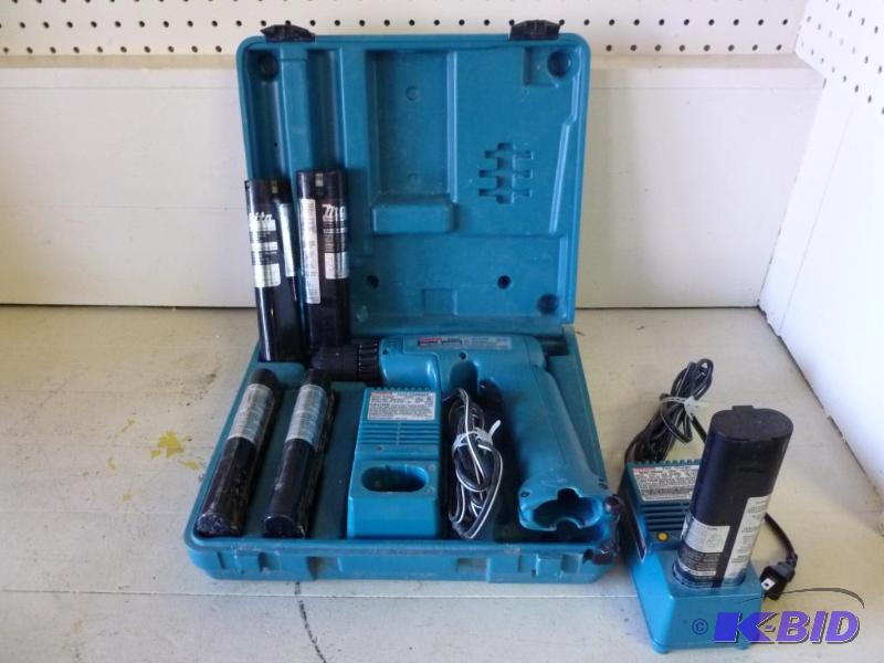 lot 9 image: Makita 9.6 v. battery operated drill model 60...