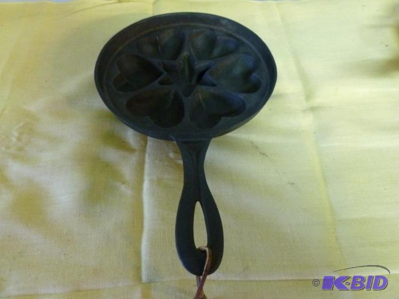 lot 91 image: Nice cast iron corn bread pan that measures 9...