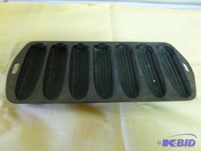 lot 93 image: Nice cast iron corn bread pan that measures 5...