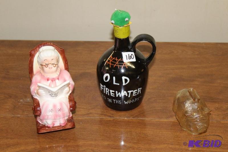 lot 160 image: 2 Piggybanks and a Empty Booze Bottle ...