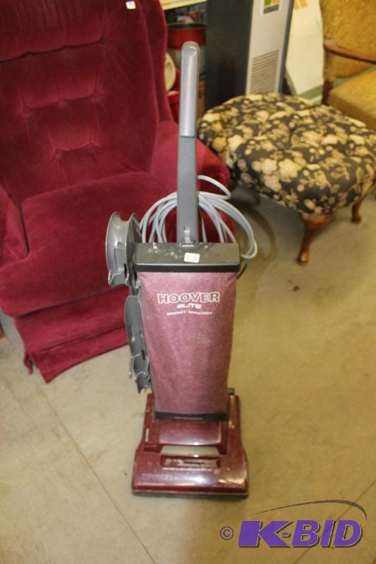 lot 23 image: Hoover Vacuum  Tested and Works Well...