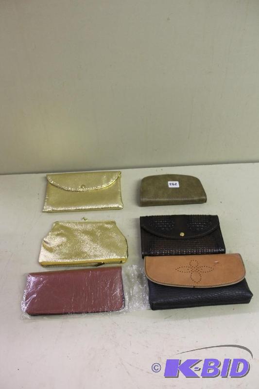 lot 282 image: 3 Pocket Books  Wallets ...