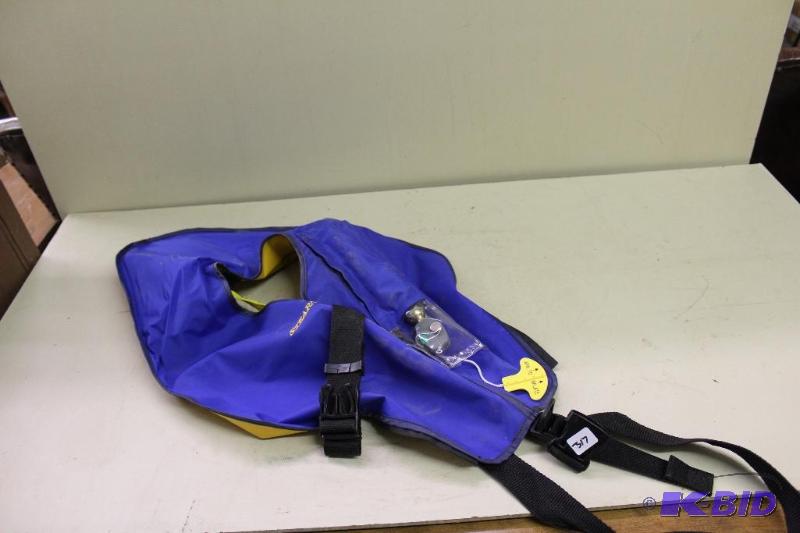 lot 317 image: Co2 Life Vest   Appears unused ...