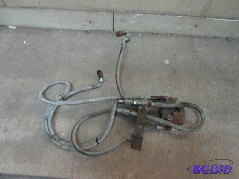 lot 15 image: Hydraulic hoses and switch valve...