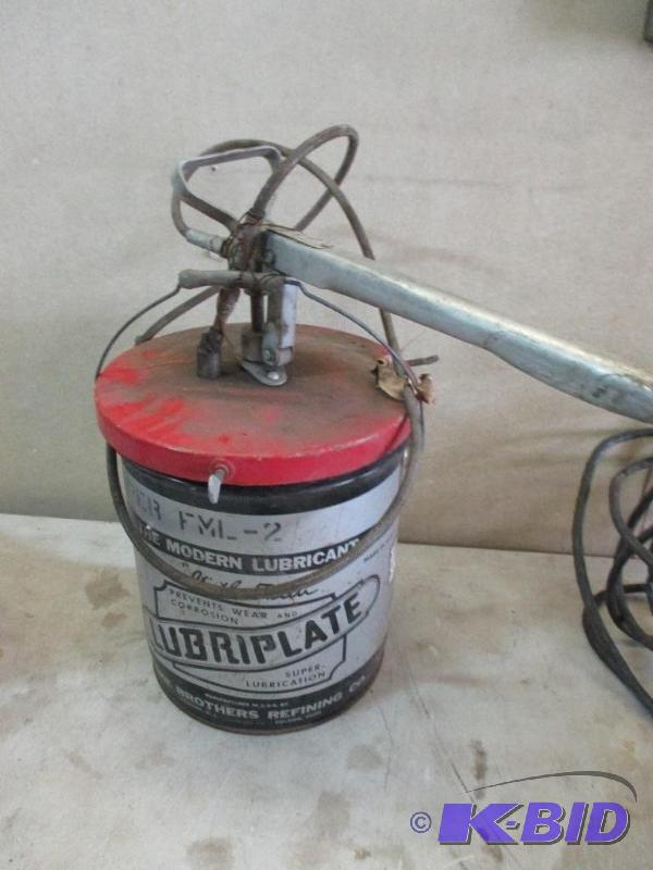 lot 22 image: Pail pump with FML-2 lubricant...