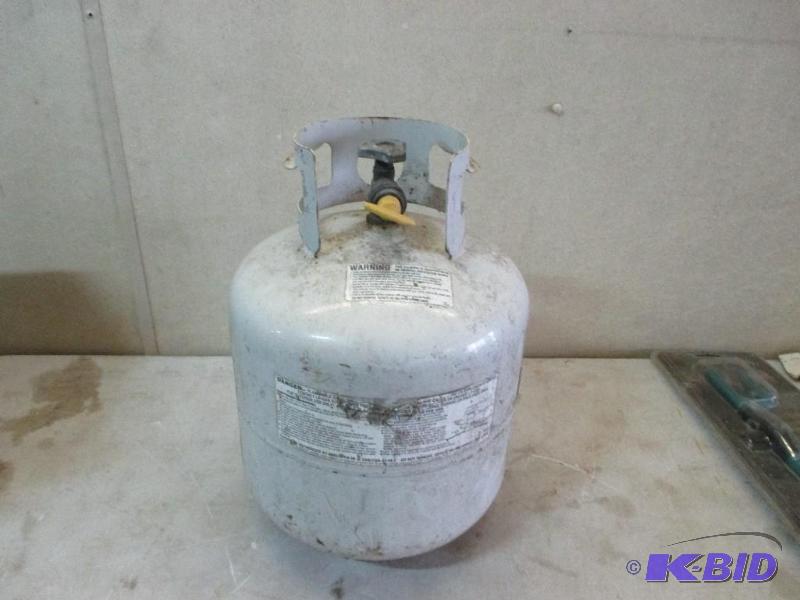 lot 7 image: 20 lb lp tank with new valve...