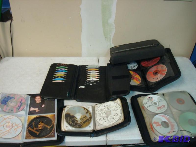 lot 104 image: Lot Of Random CDs Some Burned, Unsure Of Con...