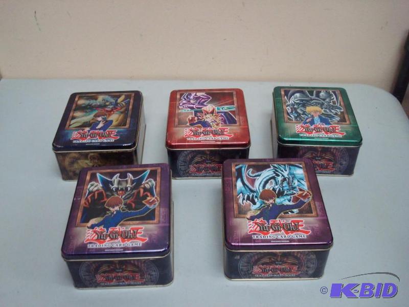 lot 111 image: Lot Of Yu-Gi-Oh Tins, Some cards Inside...