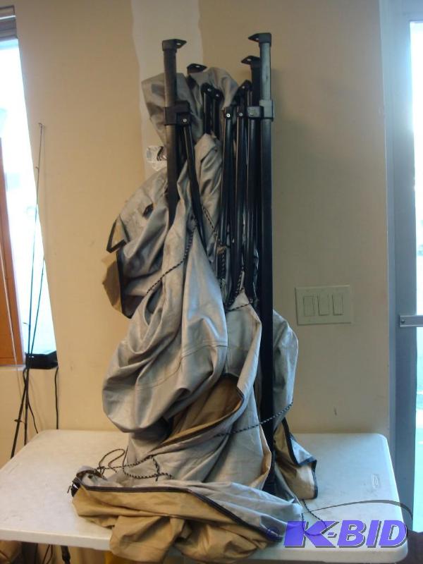 lot 159 image: Canopy Tarp And Stand, Used, Has A Broke Piec...