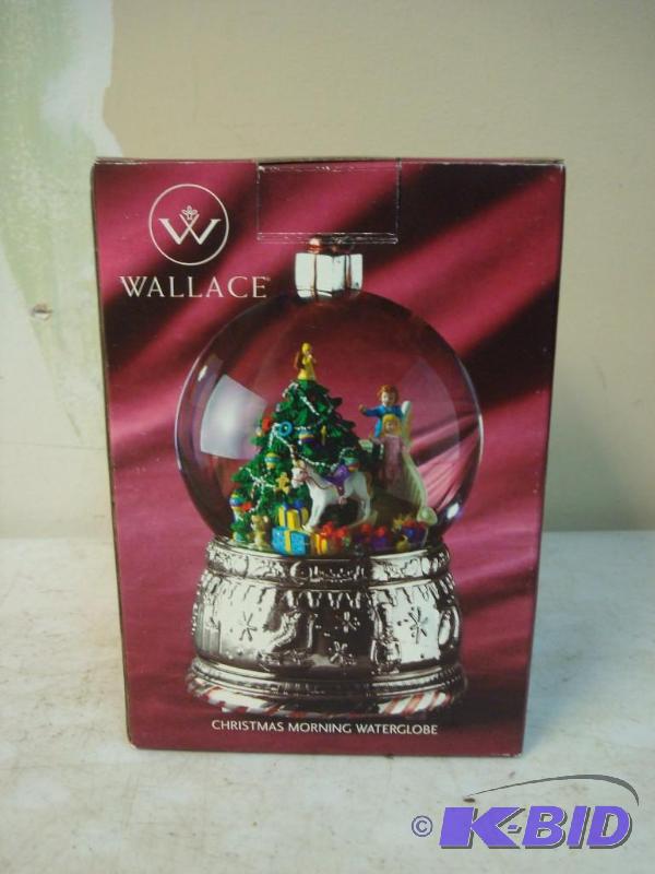 lot 77 image: New Wallace Christmas Morning Snow Globe Silv...