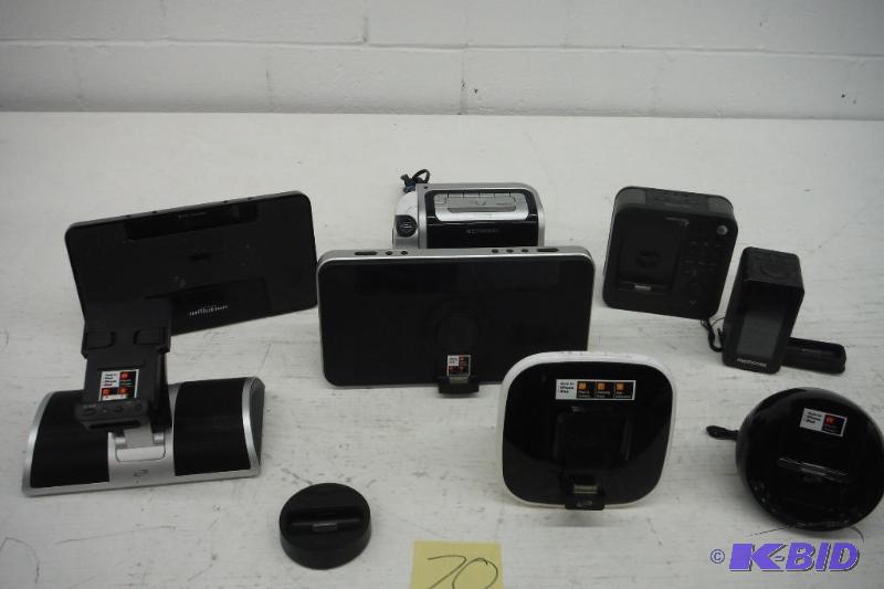 lot 70 image: Lot of 7 iphone alplified ipad docks, 1 alarm clock & a sony vidio out dock