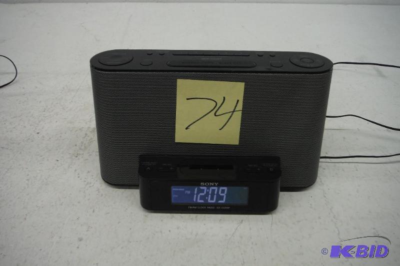 lot 74 image: Sony ICFCS10iP - AMFM Clock Radio with iPodiPhone Speaker Dock.