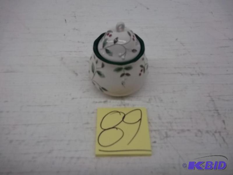 lot 89 image: Ornamental tea bag cup with cap