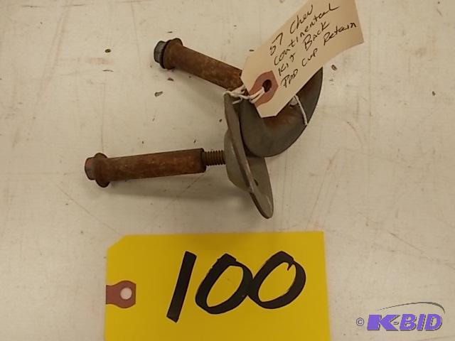 lot 100 image: 1957 Chev. Continental Kit Back Pad Cup Retai...