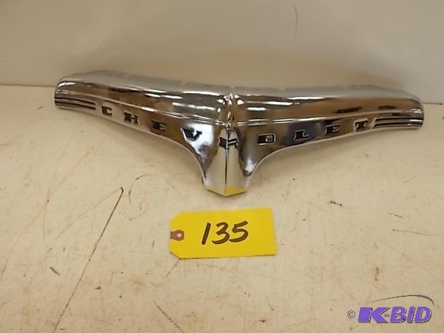lot 135 image: 1942 Chev. Radiator Grill Center Piece, NOS...