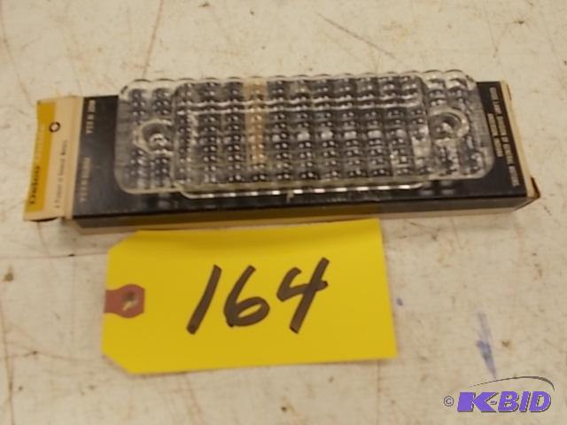 lot 164 image: 1070-72 Chev. Cargo Lamp Lens, NOS...