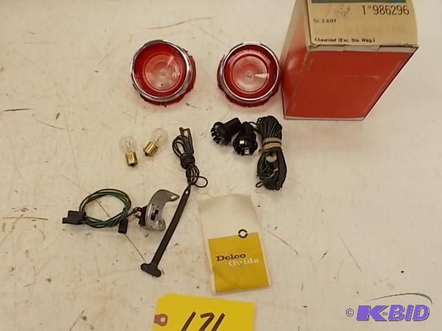 lot 171 image: (2) 1965 Chev. Backup Lamp Units, NOS...