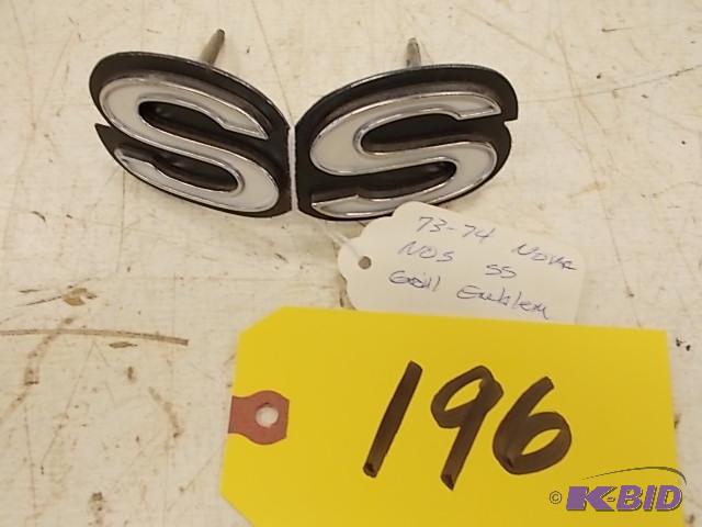 lot 196 image: 1973-74 Nova SS Grill Emblem, NOS...