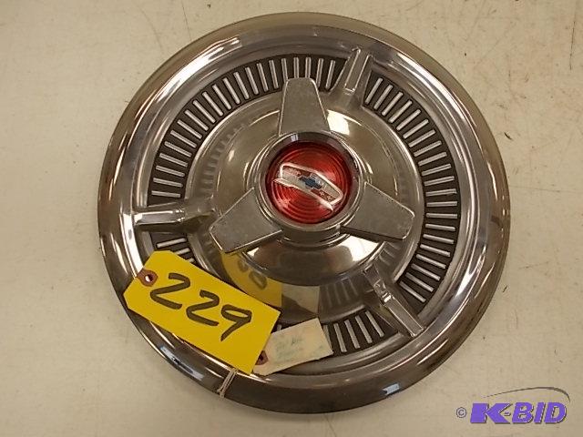 lot 229 image: 1958 Chev. Belair Spinner Hub Cap...