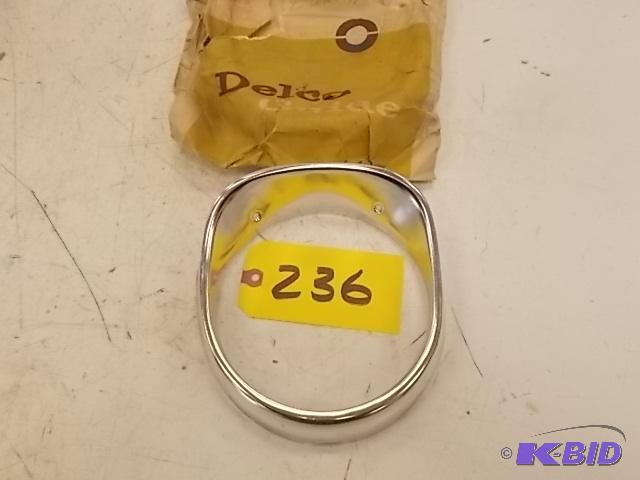 lot 236 image: 1965 Chev. Impala Left Outer Healight Bezel, ...