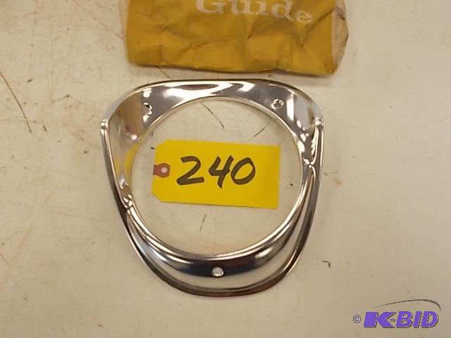 lot 240 image: 1963 Chev. Impala Left Healight Bezel, NOS...