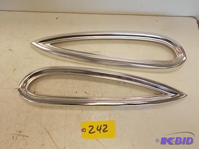 lot 242 image: (2) 1959 Chev. Tail Light Bezels, OEM Recondi...