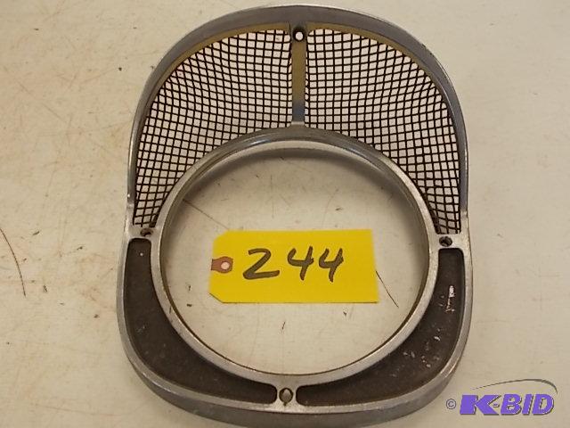 lot 244 image: 1957 Chev. Headlight Bezel...