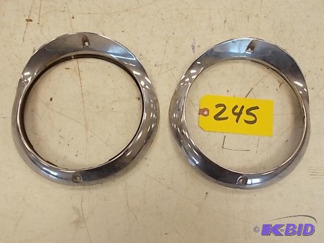 lot 245 image: (2) 1955 Chev. Headlight Bezels...