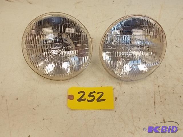 lot 252 image: (2) Working T-3 (6012) Head Lights...
