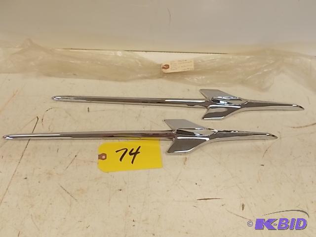 lot 74 image: Pair of 1956 Chev. Fender Bird Ornaments, NOS...