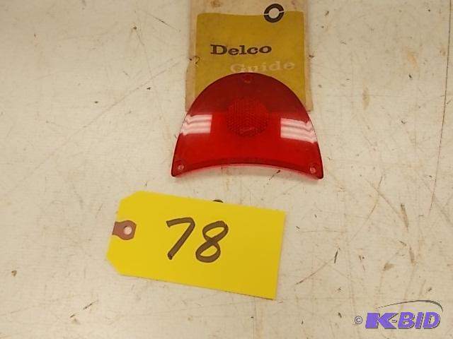 lot 78 image: 1957 Chev. Tail Light Lens, NOS...