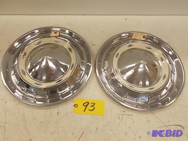 lot 93 image: (2) 1955 Chev. Belair Hub Caps...