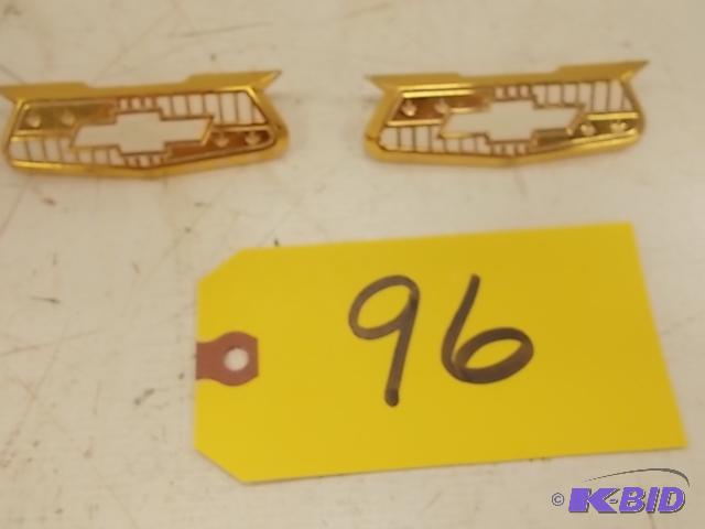 lot 96 image: (2) 1955-56 Chev. Belair Gold Fender Crests, ...