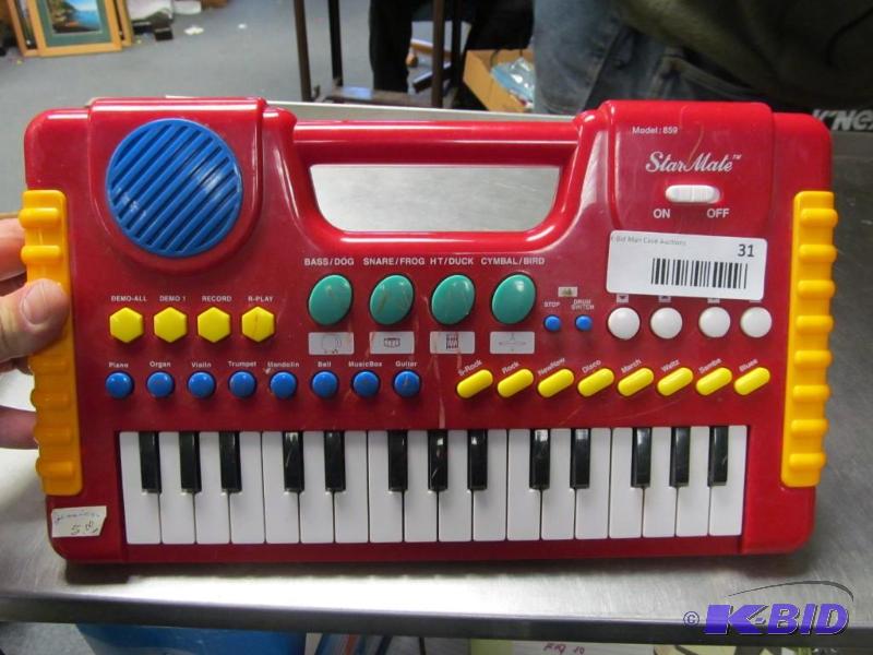 lot 31 image: Star Mate Childs Piano untested