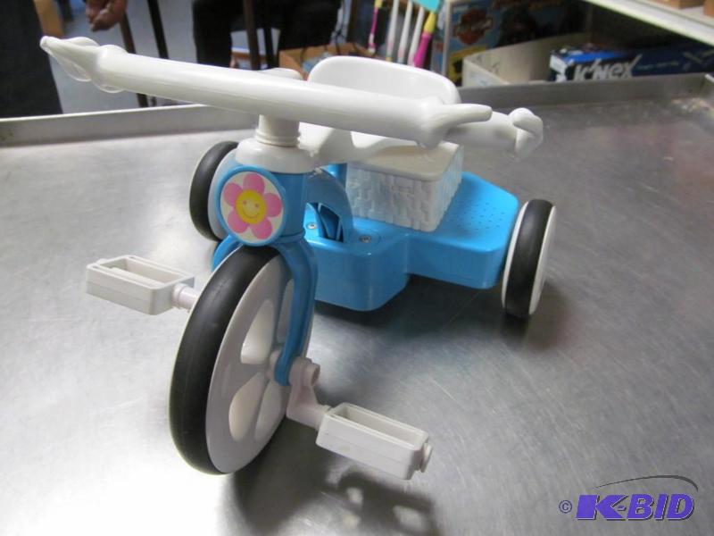lot 33 image: Small Doll Tricycle battery powered 1993 Mattel untested