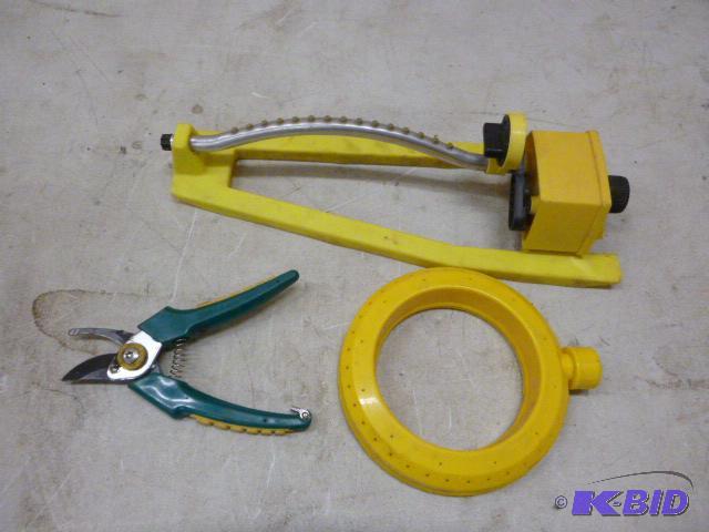lot 31 image: Two Water Sprinklers and Pruner...