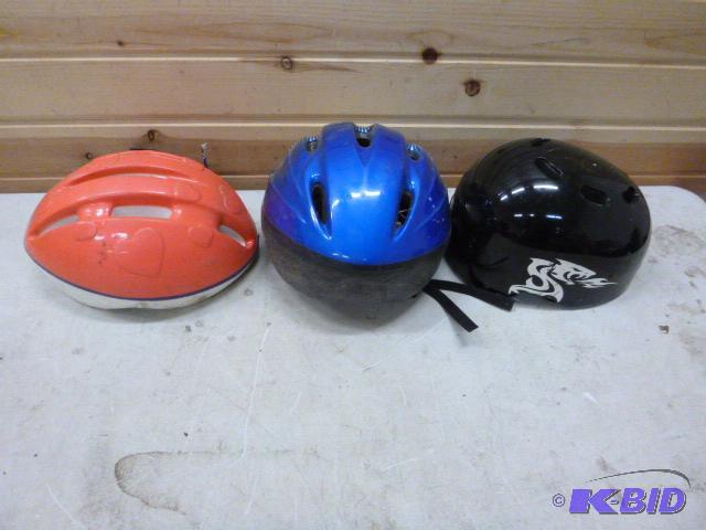 lot 73 image: Three Helmets...