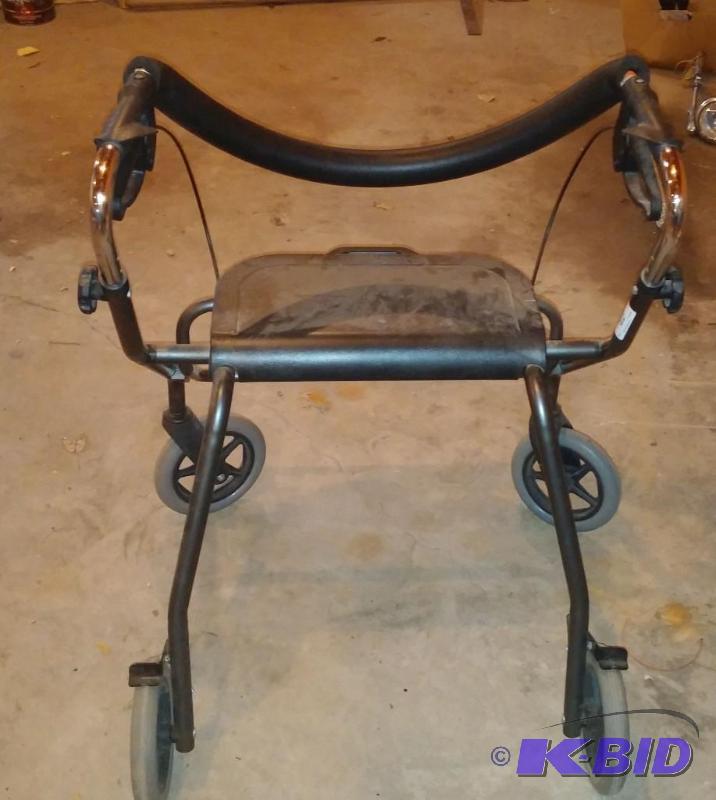 Wheeled seated Walker with brakes as shown...
