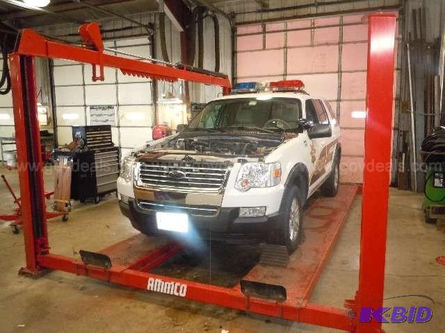 lot 12 image: Ammco Brand Model B4120LW 12,000 lb 4 Post Dr...