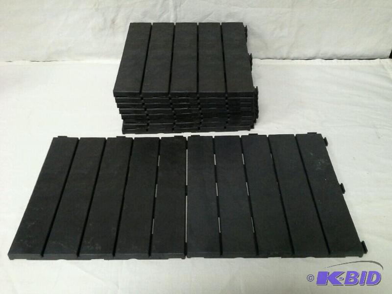lot 87 image: 10 interlocking deck tiles