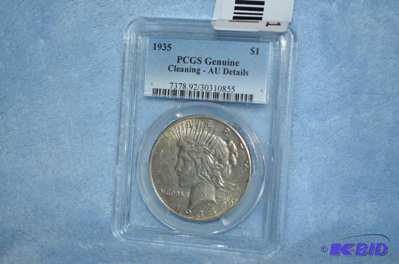 lot 31 image: 1935 Morgan Silver Dollar PCGS graded   ...