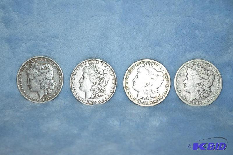 lot 44 image: Roll of Silver Dollars 4 older ones are from ...