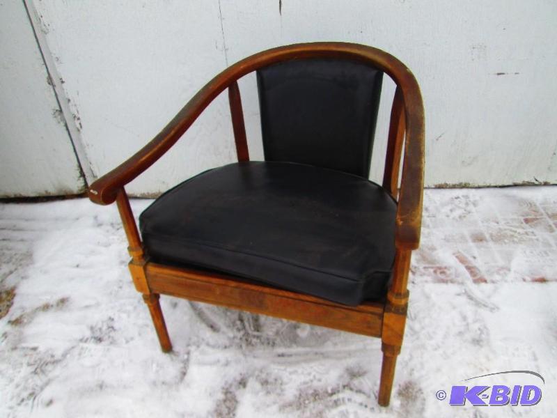 lot 300 image: Wood frame chair with black vinyl padding...