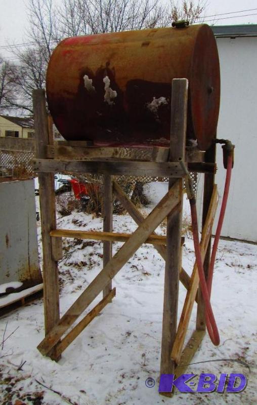 lot 7 image: 250 gallon metal fuel tank on stand, with pum...