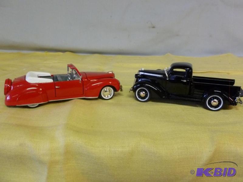 lot 103 image: Lot Of Two Signature 132 scale die cast meta...