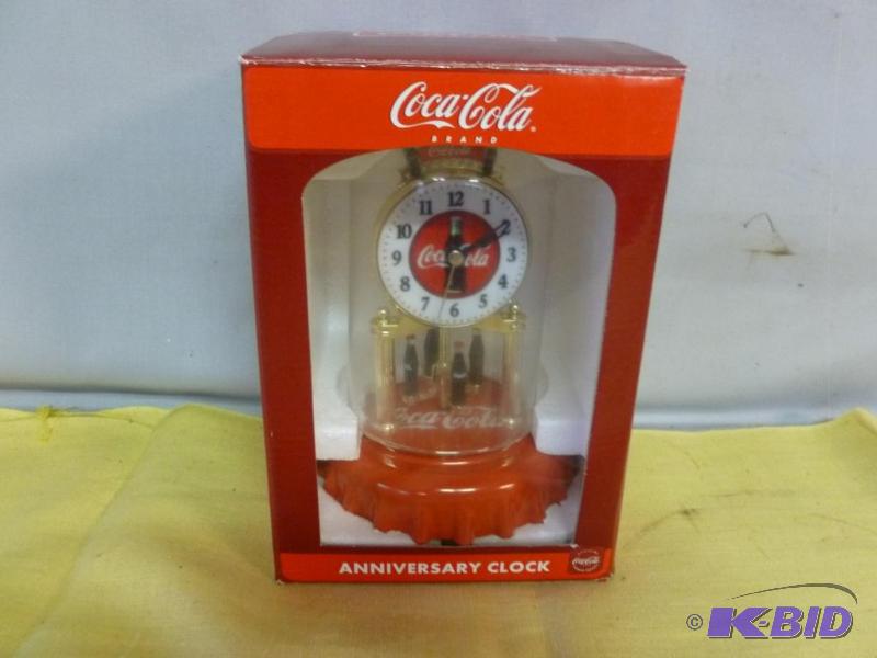 lot 115 image: M.Z Berger Coca-Cola Anniversary Clock, new i...