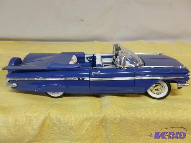 lot 139 image: Large Road Tough 1959 Chevy Impala 118 scale...