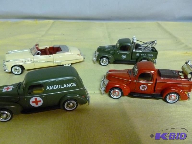 lot 205 image: Lot of four collectible 132 scale die cast m...