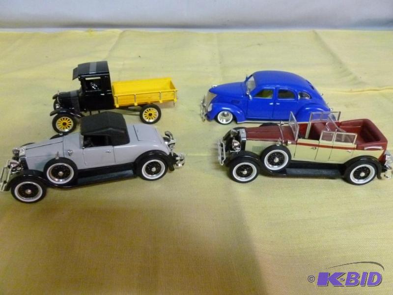lot 206 image: Lot of four collectible 132 scale die cast m...